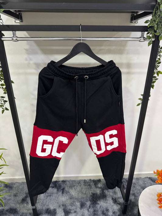 Pantalone tuta con logo a fascia GCDS