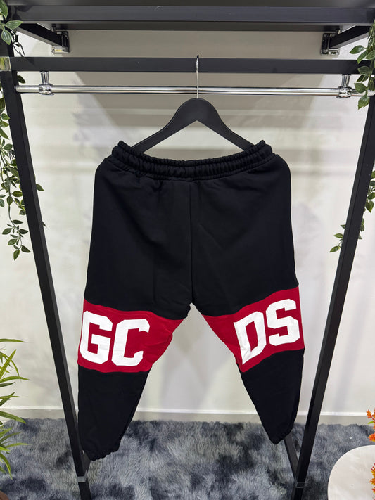 Pantalone tuta con logo a fascia GCDS